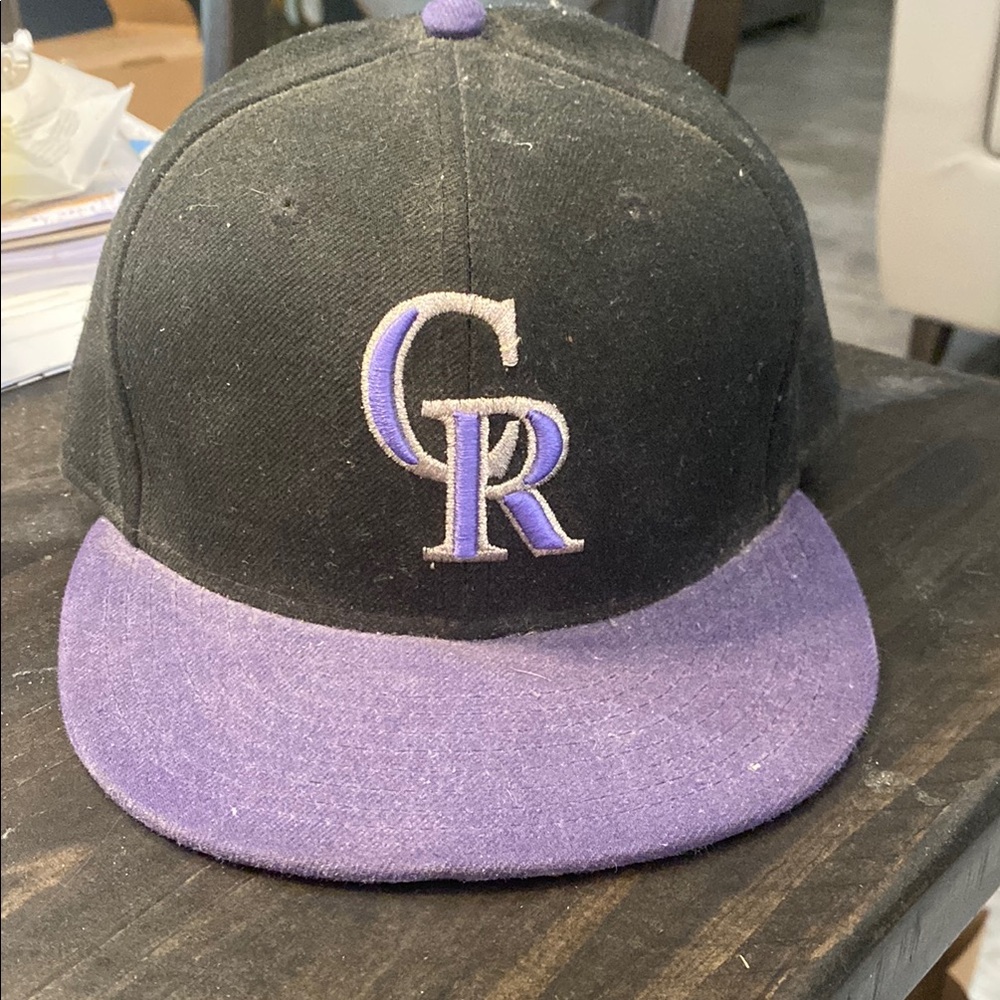Colorado Rockies fitted cap. Black and Purple Cap with CR embroidered Logo